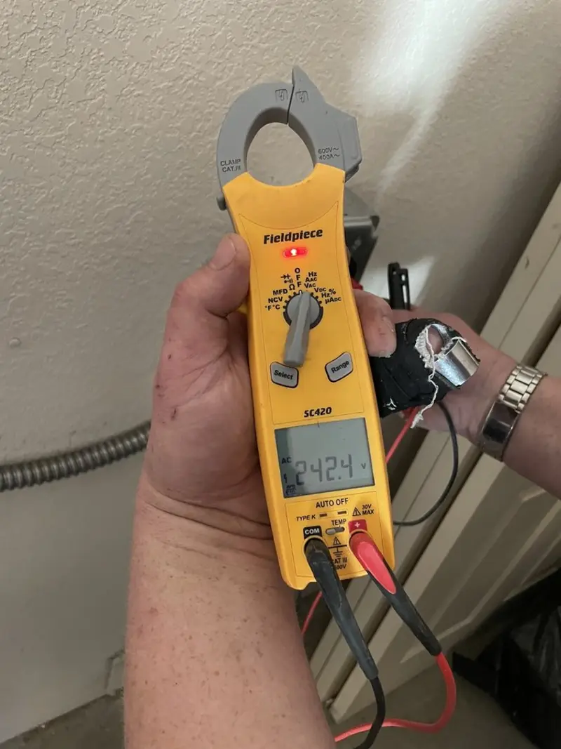 Voltage testing with clamp meter during Ceiling Fan Installation in Sulphur